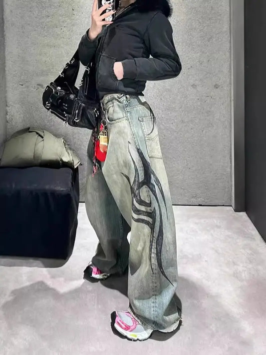 American retro washed damaged jeans Women's summer new hot design totem print mopping trousers